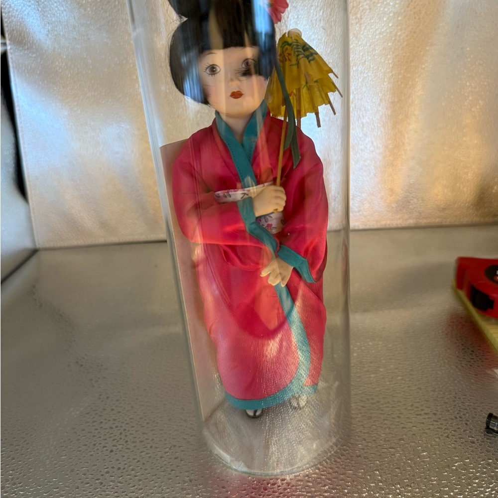 Akiko of Japan She is Bisque Porcelain and is 9 inches tall.